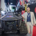 Interview: Oliver Rasche, Geschäftsführer von Alpha Robotics, neben einem UGV Wolf R1.