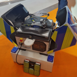DJI-Drohne in Abflugstation und Polizeiausführung von Dronrise auf der INFOPOL XPO112.